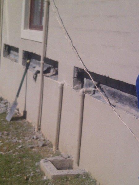 Damp proofing, waterproofing to weep hole
                  cavities in external walls, door thresholds and roof
                  wall abutments.
